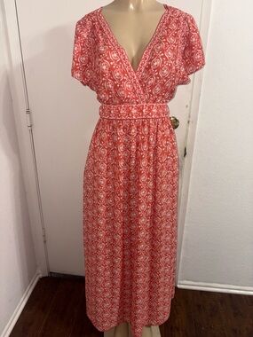 Max Studio maxi dress with an open lower back and short flutter sleeves
